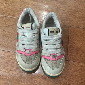 Gucci children’s screener sneakers runs small beige with pink and green details